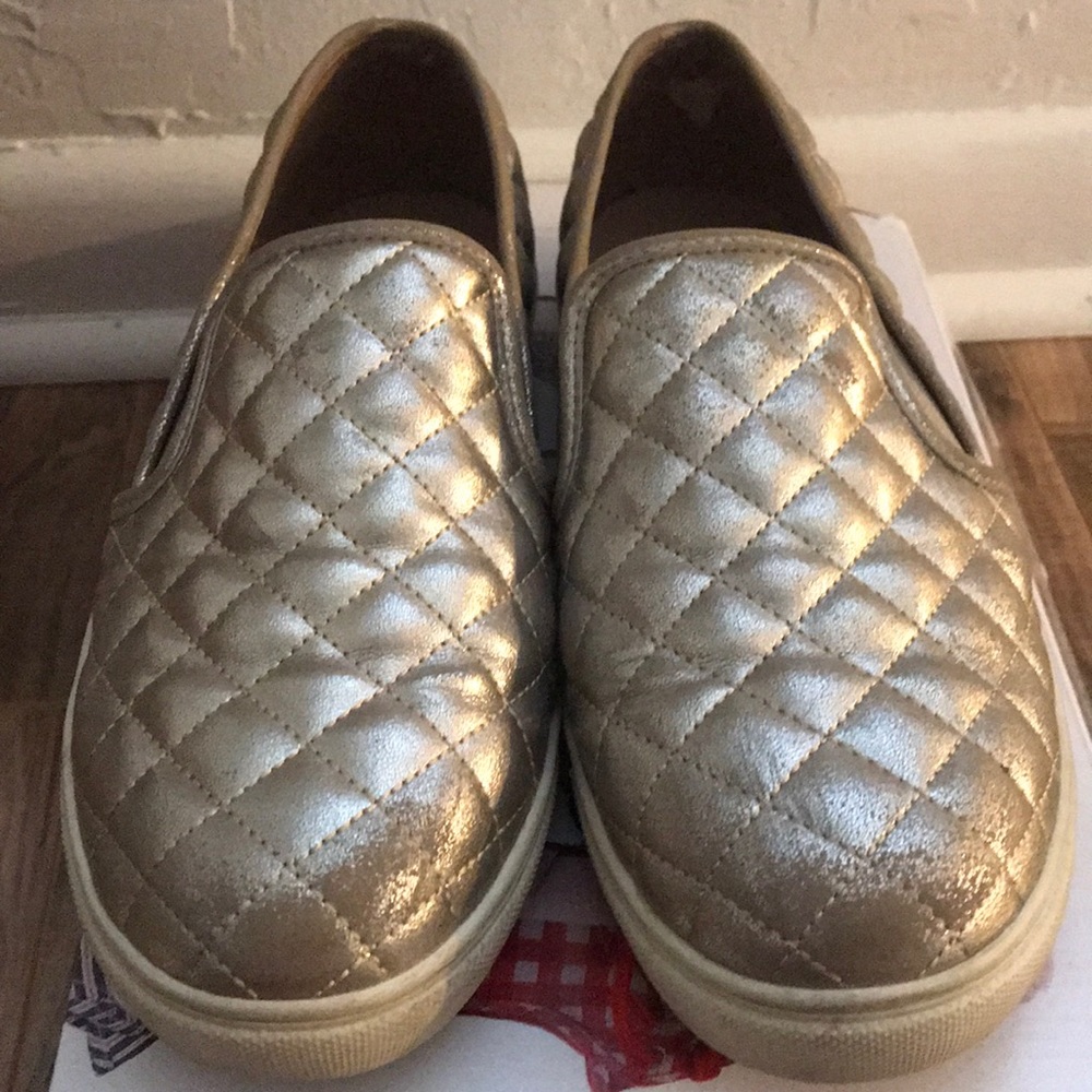 Steve Madden gold slip-on sneakers
